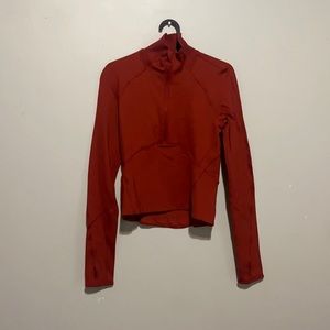 Orange lululemon long sleeve jacket.